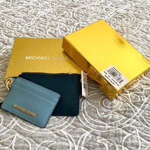 MK small wallet. Beautiful colors, offers tones of functionality.